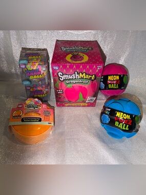 1  Scented Orange Squishy Dumpling, 1 Squishy DragonFruit & 2 Fuzz & Band Balls